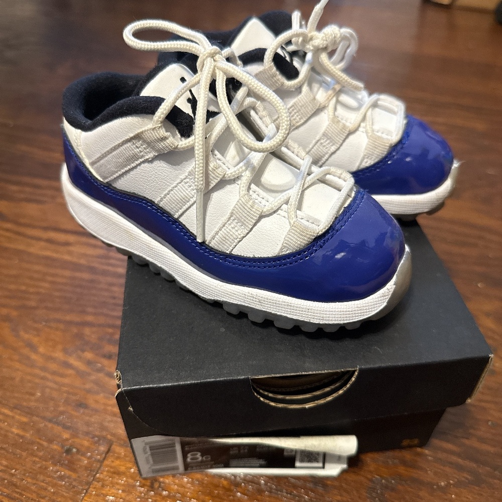 Jordan 11 low (white & blue patent leather)